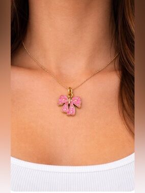 Louis Vuitton stamped Pink and Gold Bow Pendant charm